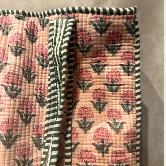Handcrafted pink floral quilted cotton tote bag with striped trim