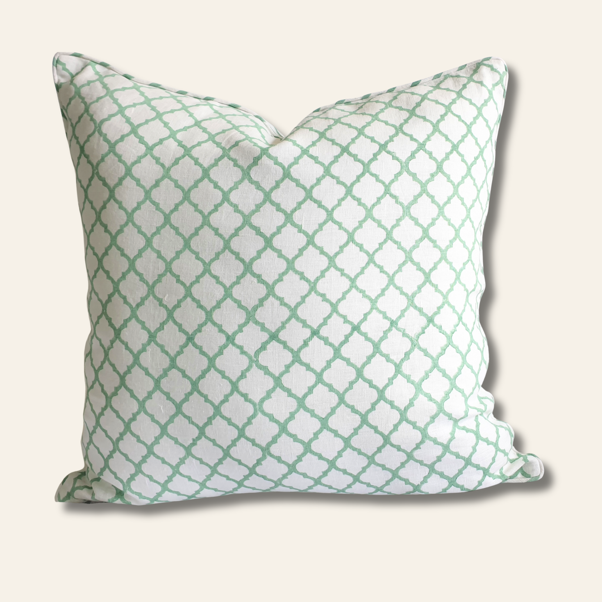Linen pillow cover featuring a jade green lattice block print