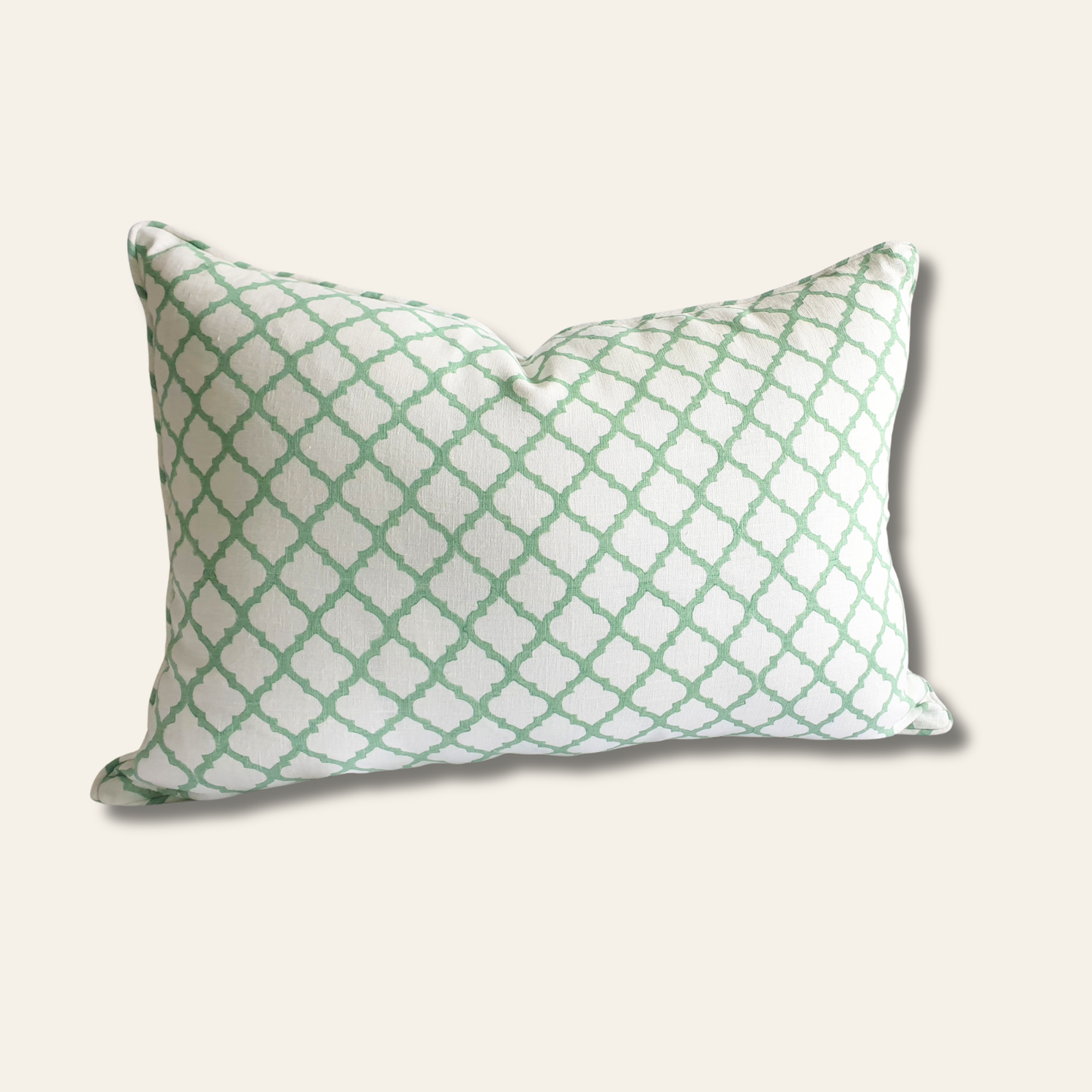 Linen pillow cover featuring a jade green lattice block print
