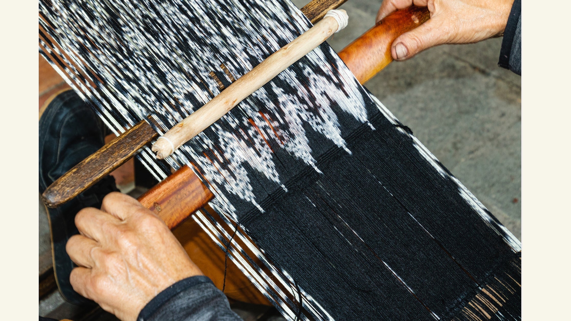 Traditional Ikat textile being woven by hand